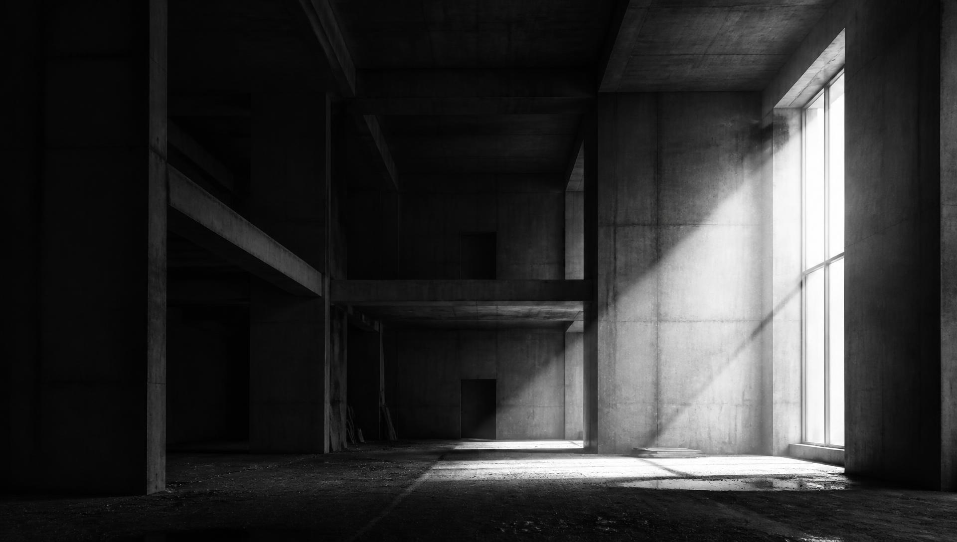 Interior de obra en hormigón visto en blanco y negro